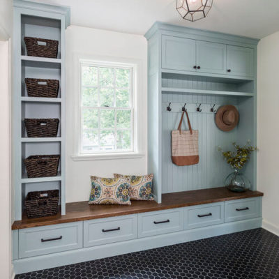 mudroom-with-black-tile-and-teal-built-ins